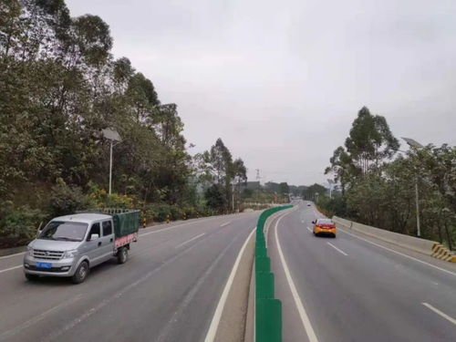 曲江這條國(guó)道完成路面改造通車?yán)? class=